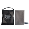 A black microfiber towel bag and a folded gray microfiber towel are shown side by side.