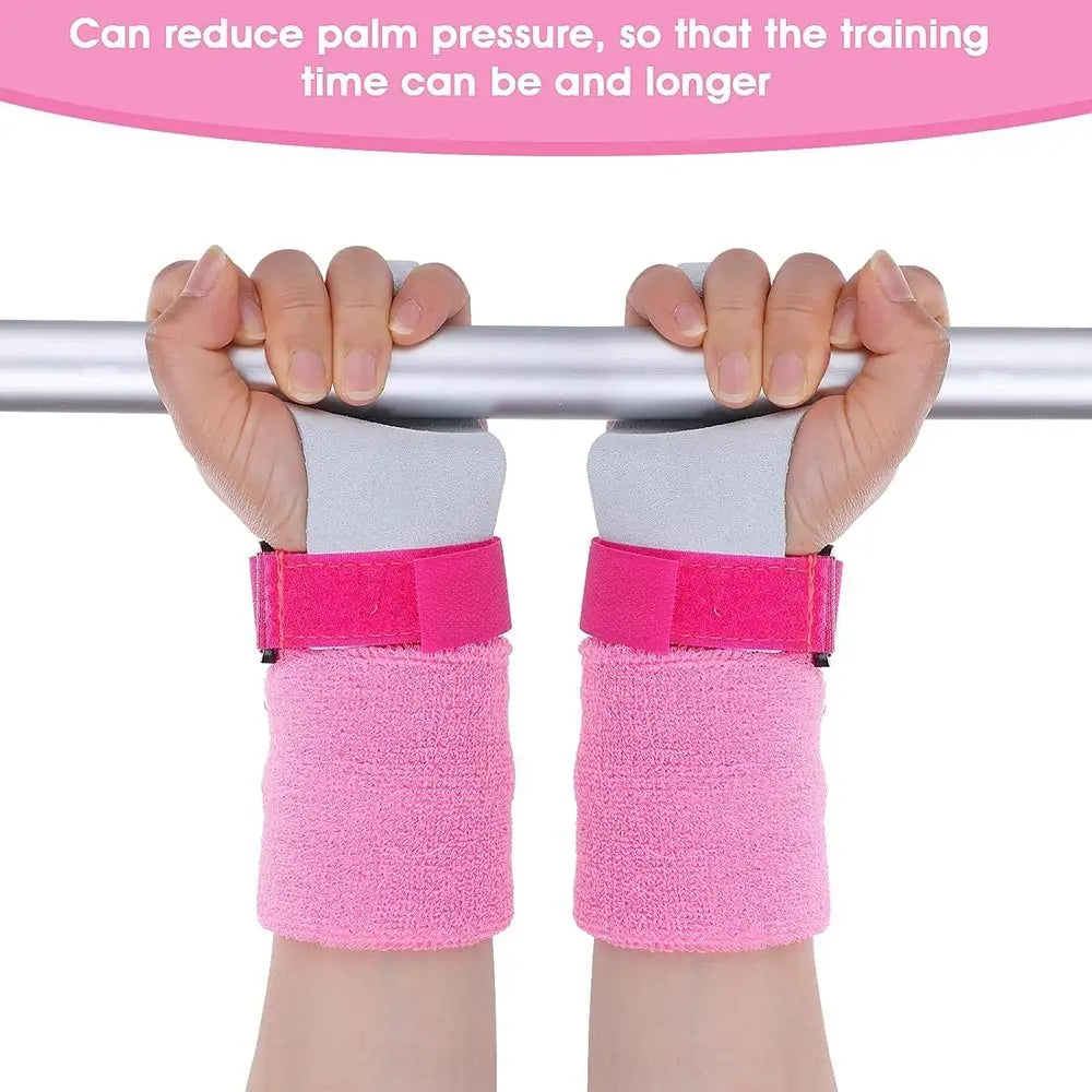 Hands gripping a silver bar with pink wristbands for gymnastics training