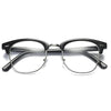 A pair of black metal-framed computer glasses with clear lenses.