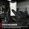 A hand wearing black leather riding gloves is touching a smartphone displaying a map.