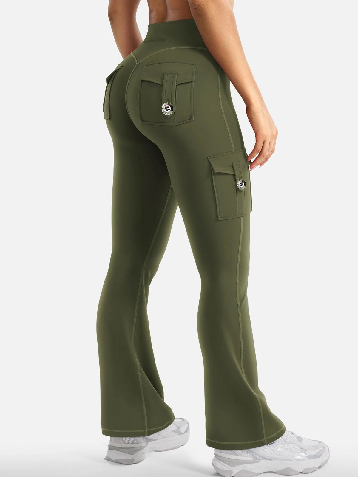 A model wearing olive green high-waisted flared fitness pants with cargo pockets.