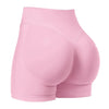 Light pink high-waisted knit fitness shorts shown from the rear view
