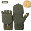 Olive green knit gloves with a fluffy pom-pom on top and a brown tag.