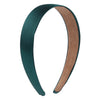 A headband featuring a two-tone design with dark teal and brown satin fabric.