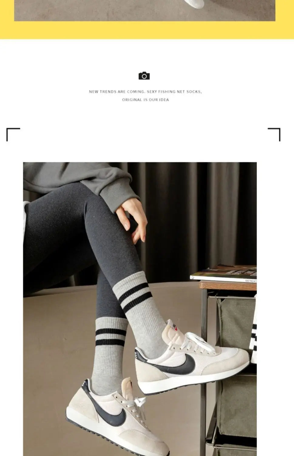 A person is shown wearing white and black striped breathable sport socks on their feet.