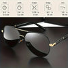 A pair of black men's rectangle polarized sunglasses resting on a dark surface.