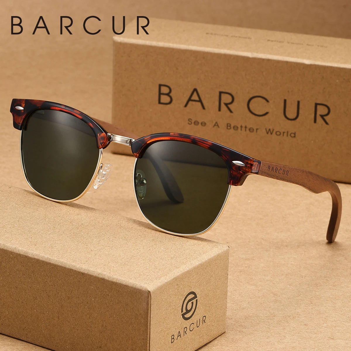 Un par de gafas de sol tortugas marrones sobre una caja de cartón con el logo BARCUR.