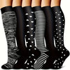 A set of black knee-high compression socks featuring various white patterns including stripes and polka dots.