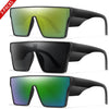 Tres pares de gafas de sol grandes UV400 en tonos verde, negro y púrpura.