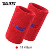 A pair of red fuzzy sport wristbands with the AOLIKES logo visible.