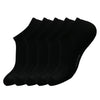A set of black men's essential warm socks for outdoor activities, displayed in a row.