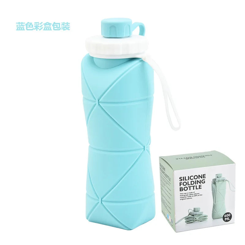 A light blue silicone folding sports water bottle with a white cap and attached hose.
