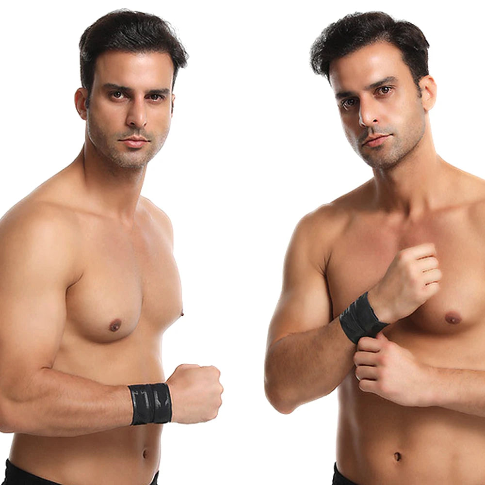 A man wearing a black wrist support brace for sports and daily use.