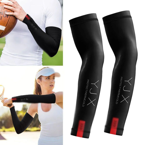 Black protective arm sleeves being worn by a woman outdoors for sports or outdoor activities