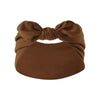 A brown fabric headband tied in a bow, suitable for a bohemian bunny ear style.