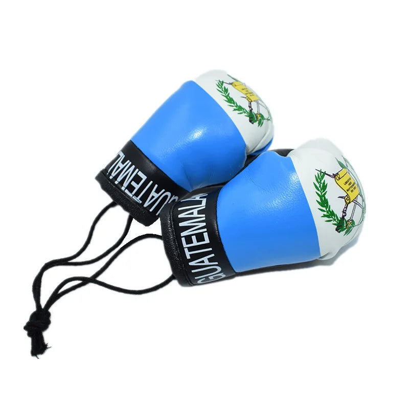 Mini PU-Leder-Boxhandschuh Schlüsselanhänger mit der Flagge Guatemalas in blau und weiß.