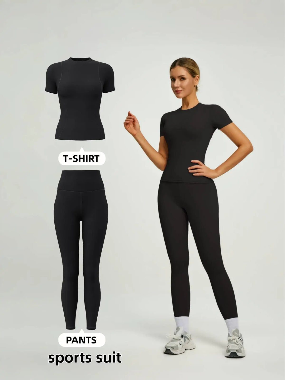 Model in a black sports suit with t-shirt and matching pants.