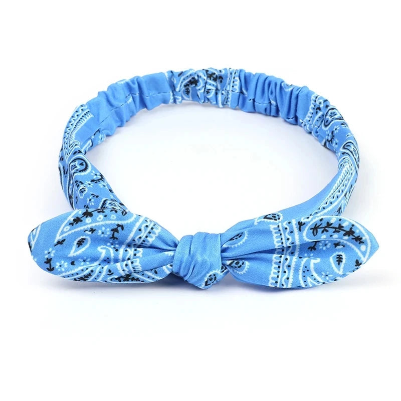 Blue boho paisley elastic hair headband with a decorative bow