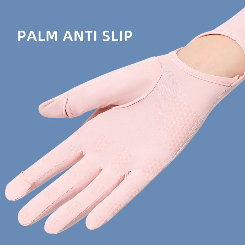 A light pink palm anti slip glove worn on a hand, showing the texture and fit.