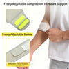 A hand wearing a light-colored compression brace on the elbow, showing adjustable features and a buckle.