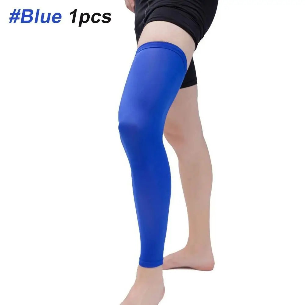 A person is wearing a royal blue knee calf compression sleeve on their leg.
