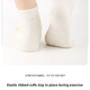 White ribbed elastic cuffs for feet, showing a close-up of the yoga socks.
