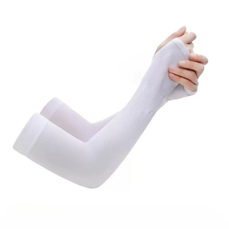 A hand is wearing a white cycling or outdoor arm guard on its forearm.
