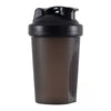 A black leakproof protein shaker bottle with a screw-on cap.