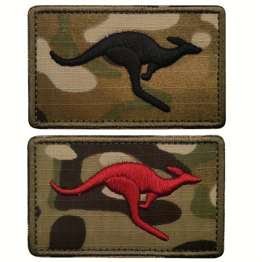 Embroidered patch featuring a silhouette of a kangaroo in red on a camouflage background