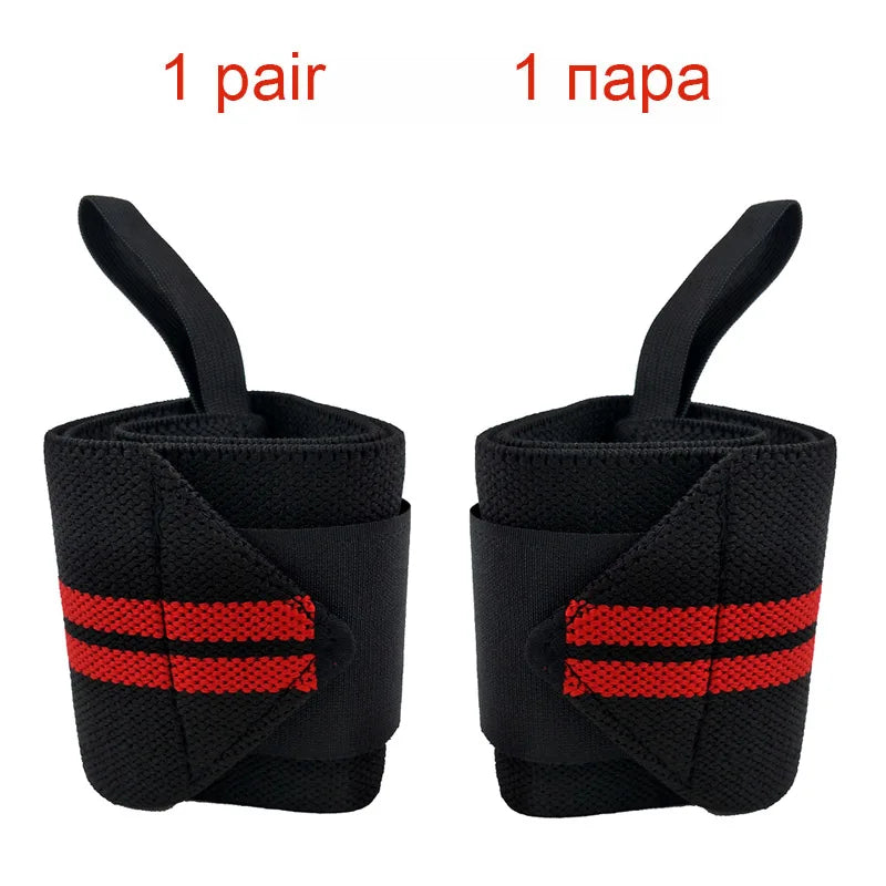 A pair of black heavy duty wrist wraps with red stripes shown from the side.