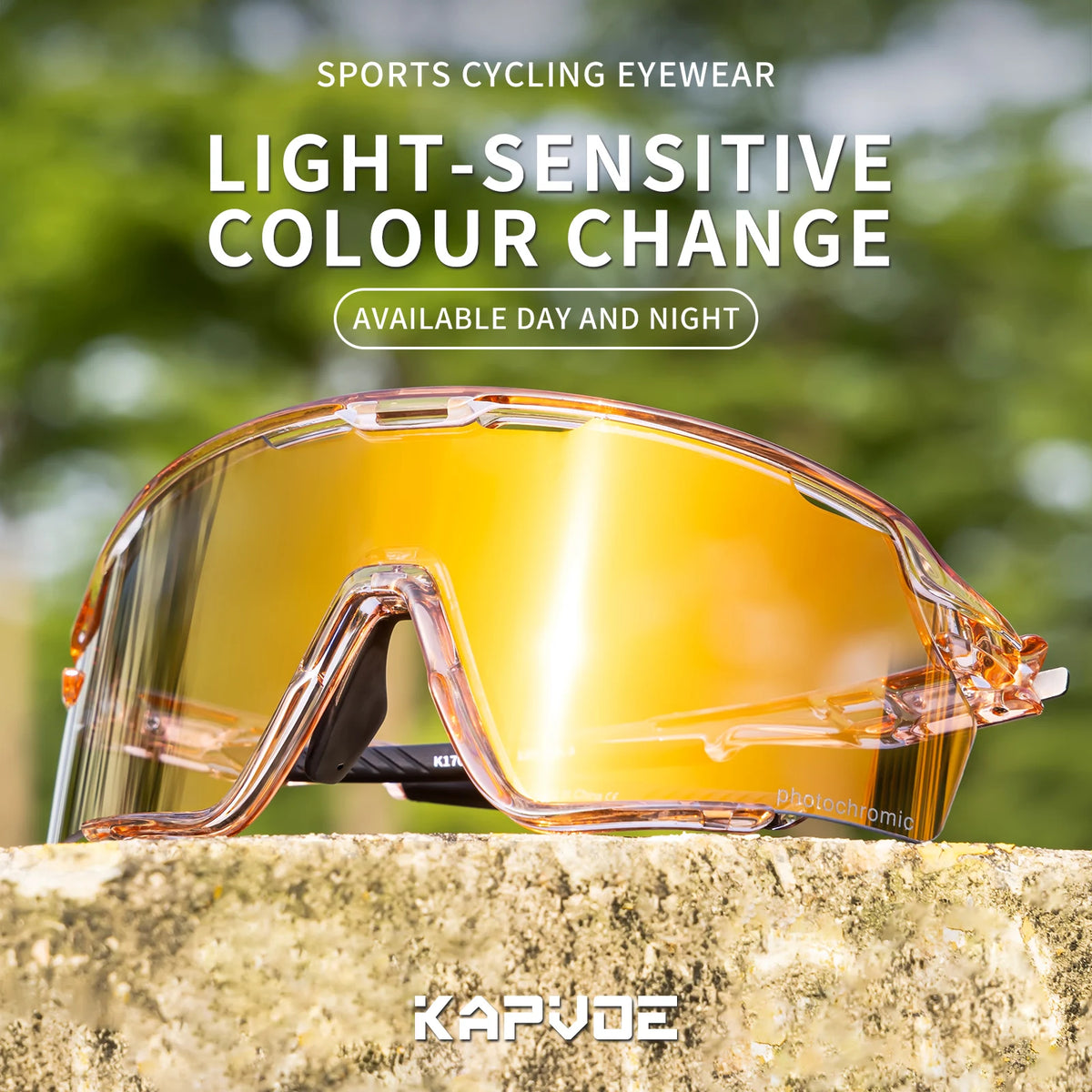 A pair of clear photochromic cycling sunglasses resting on a textured surface.