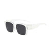 Clear wrap-around sunglasses with dark lenses and glasses compatibility