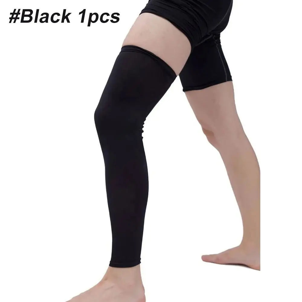 Black performance knee calf compression sleeves worn on a leg.