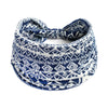 A navy blue and white patterned bohemian cotton stretch headband folded and displayed against a white background.