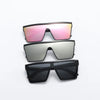 A set of three retro square sunglasses in pink, silver, and black.