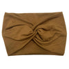 A brown women's elastic sports headband folded into a knot.