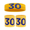 Un set de bandeaux de tête et de poignet jaunes avec le chiffre 30 imprimé en bleu.