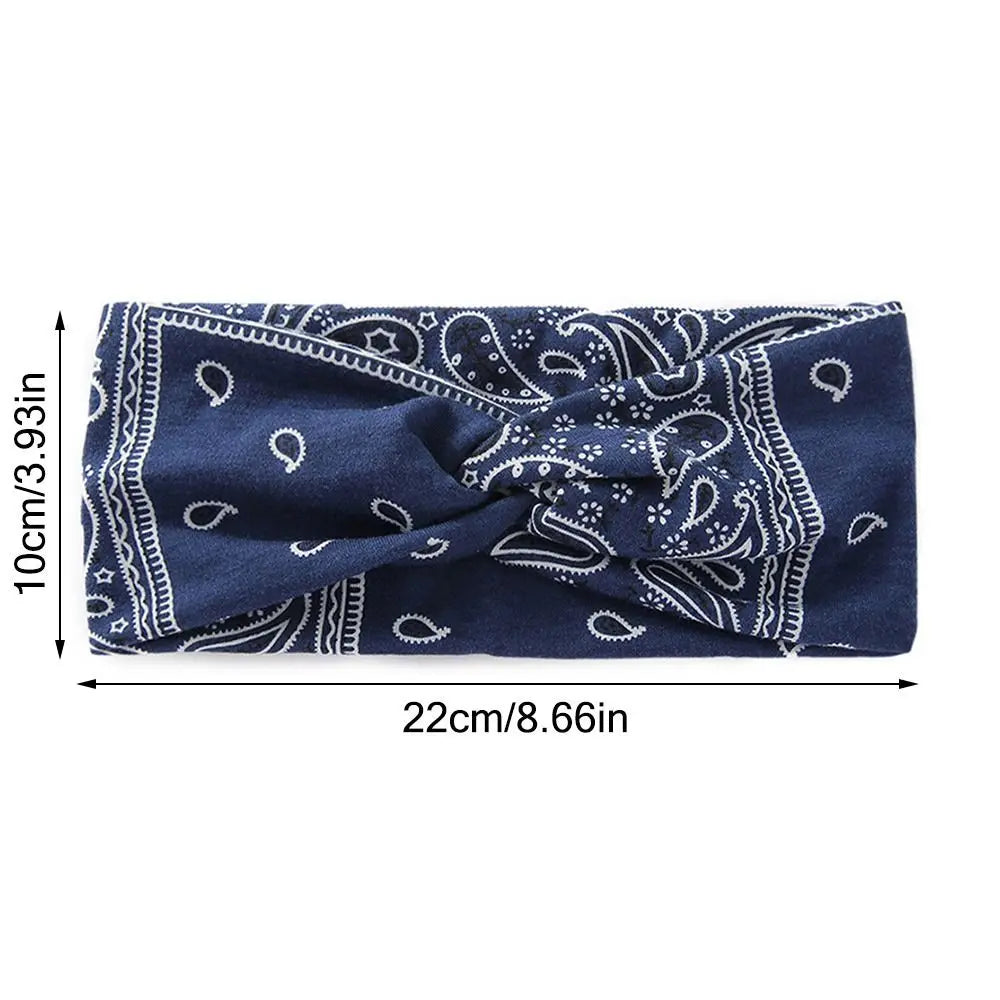 Diadema elástica de tela azul marino con estampado de paisley blanco