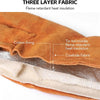 Close-up of a three-layer fabric glove showing cotton lining, tin foil insulation, and cowhide fabric.