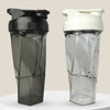A clear and black high-performance Tritan protein shaker bottle shown from the side.