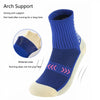Blue and beige performance sports grip socks shown in a side view with text describing arch support and widened soles