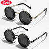 A pair of black polarized round sunglasses with adjustable dimming features shown against a white background.