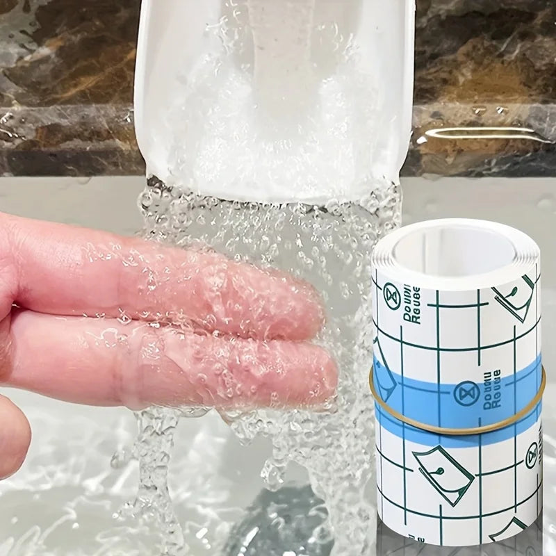 A hand is holding a transparent self-adhesive tape while it is being wet under running water.