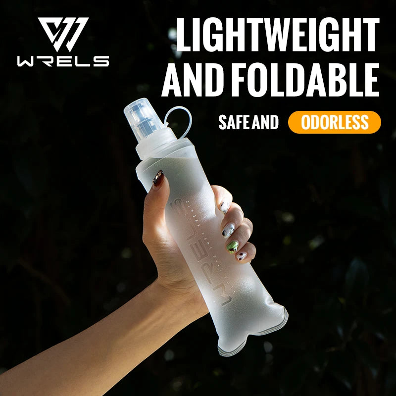 A hand holds a clear, lightweight and foldable silicone hydration flask for active use.
