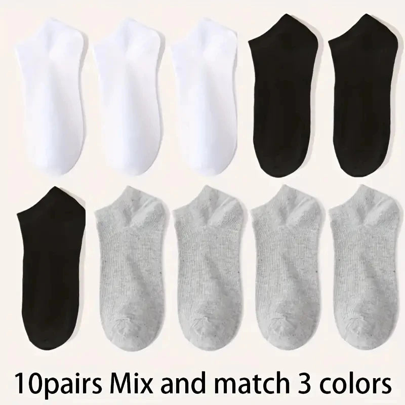 Ten pairs of mix and match ankle socks in black and white colors