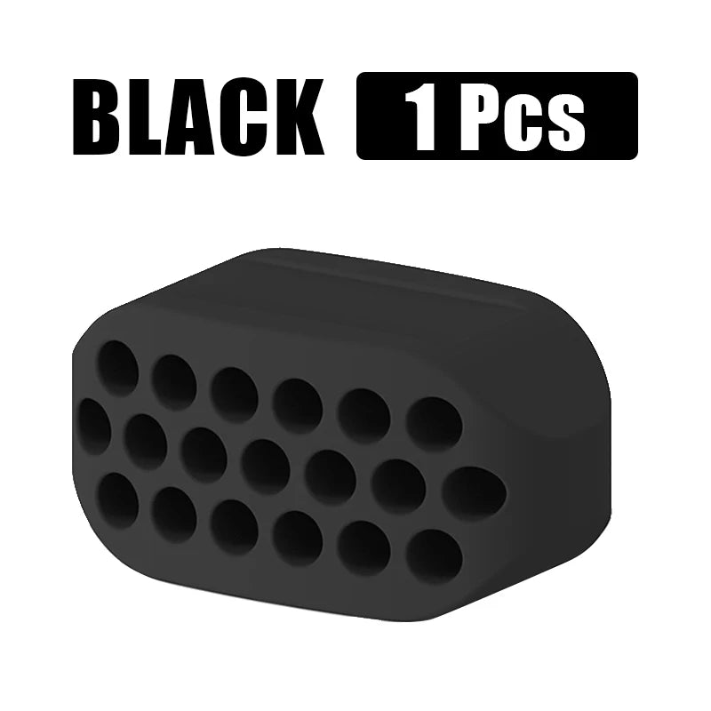 Black silicone jawline exerciser and facial toner, packaged as one piece.