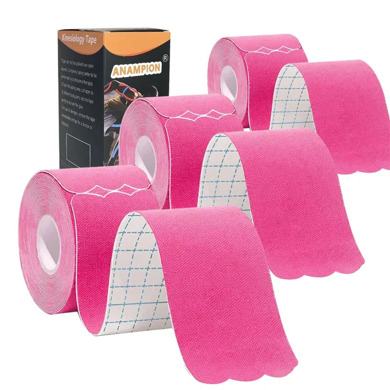 Rolls of pink kinesiology tape for joint and muscle support displayed next to its packaging.