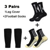 A set of three pairs of black football socks and one leg cover with yellow accents.
