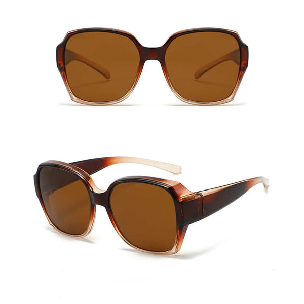 Gafas tintadas marrón con monturas de tortuga mostradas contra un fondo blanco.