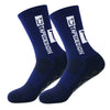 A pair of navy blue anti-slip performance sports socks with white text branding.